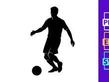 Silhouette of a soccer player kicking a ball in action