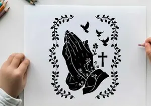 Praying hands silhouette with cross and birds