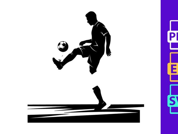 Silhouette of a soccer player kicking a ball in mid action