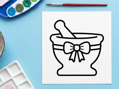 Mortar and pestle with decorative bow for herbal remedies. Classic apothecary tool used in natural medicine and wellness preparation.