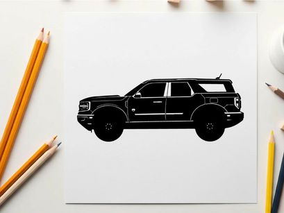 Silhouette of a large black suv with a boxy design