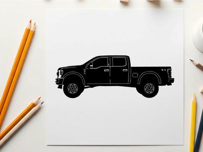 Black silhouette pickup truck with orange tremor text