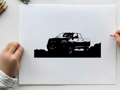 Silhouette of a pickup truck in a rugged outdoor setting silhouette