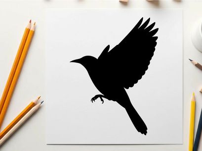 Silhouette of a bird in mid flight with wings spread wide