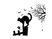 Black cat silhouette on fence under full moon