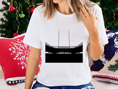 A black and white photo of a rugby goal post in a stadium