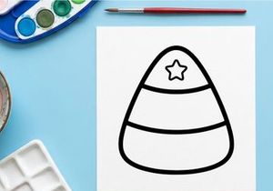 Candy corn icon with star. Simple black outline graphic for Halloween design projects.