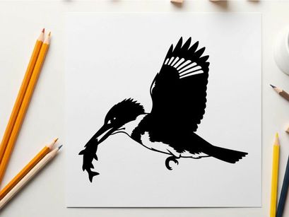 Silhouette of a kingfisher in flight with fish