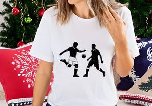 Two soccer players in action kicking and chasing the ball competitively