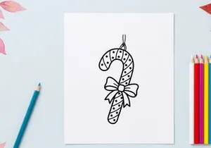 Christmas candy cane ornament line art illustration with a decorative bow for coloring page