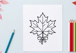 Stylized maple leaf illustration with bow. Artistic botanical design for nature themes.