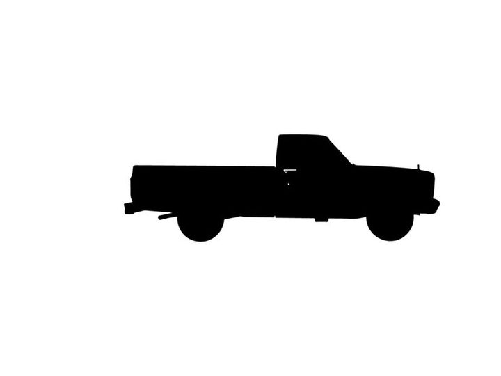 Silhouette of a classic pickup truck against a white background