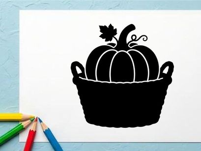 Silhueta de uma abóbora em uma cesta para colheita de outono ou Halloween
