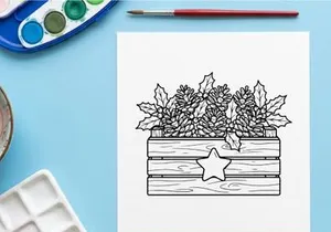Hand-drawn wooden Christmas star box filled with festive silver snowflake ornaments and pine sprigs