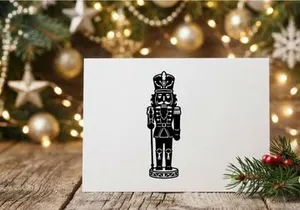 Ikon siluet kacang pemecah kacang hitam putih untuk proyek desain liburan Natal