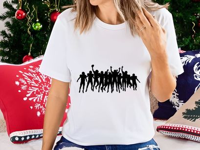 Silhouette of a group of people jumping in celebration with raised arms in unison