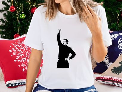 A man with his fist raised in a gesture of triumph or defiance