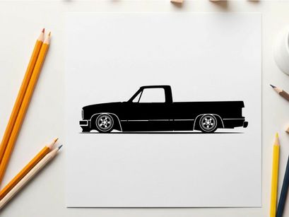 Silhouette of a classic lowered pickup truck in black