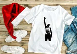A black silhouette of a referee signaling a call in a sports game
