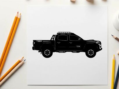 Silhouette of a black pickup truck with roof rack