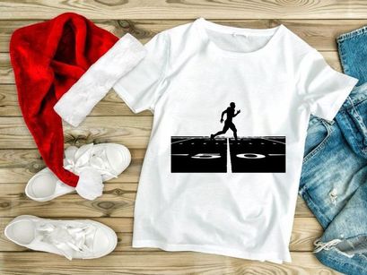 Athlete sprinting on a track field during a competitive event at night