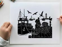 Silhouette of a man working on a dock with boats