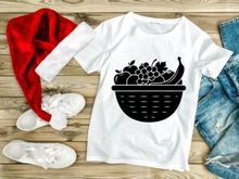 Fresh fruits in woven basket healthy eating minimalist black white