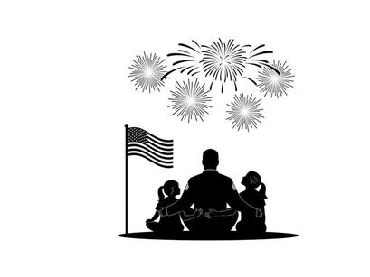 Patriotic family silhouette watching fireworks on 4th of july