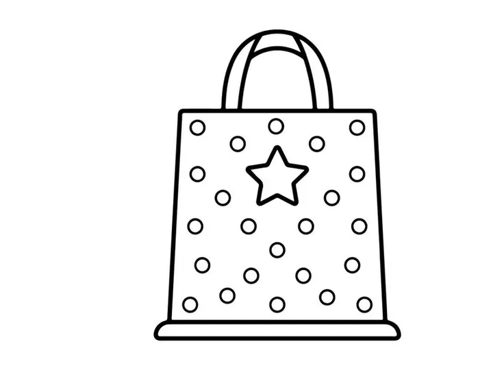 Halloween themed gift bag with star pattern. Festive trick or treat candy tote for seasonal celebrations.