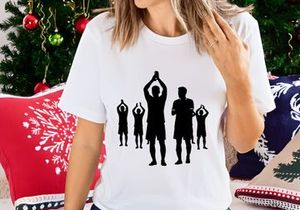 Silhouettes of people practicing yoga or meditation in a group setting