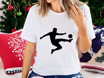 A soccer player kicking a ball in mid air with dynamic movement and skill