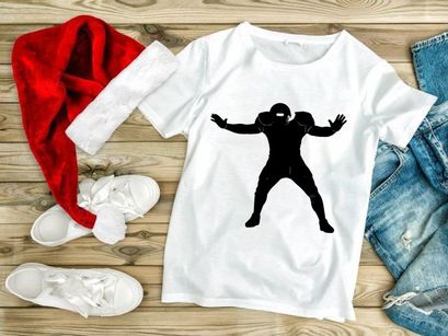 American football player in defensive stance