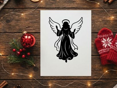 Black silhouette of a Christmas angel with wings and halo isolated on white background