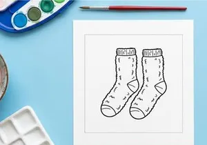 Hand-drawn Christmas socks with doodle designs and festive holiday patterns for seasonal decor