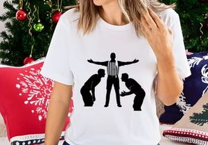 Referee separating two boxers in a boxing match with outstretched arms