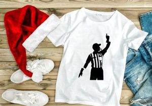 A black silhouette of a referee signaling a penalty in a sporting event
