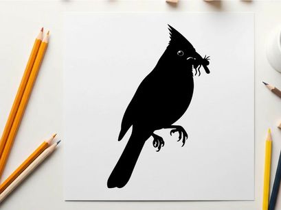 Silhouette of a cardinal holding a worm in its beak profile view