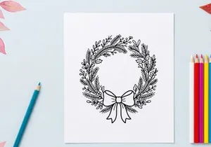 Hand drawn Christmas wreath with pine branches and bow, black and white line art illustration