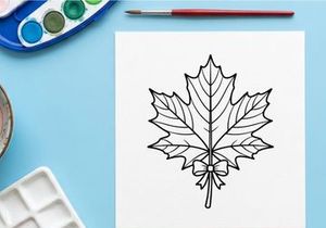 Cozy autumn scene with a maple leaf illustration. Warm, inviting mood for seasonal design projects.