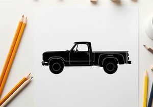 Silhouette of a classic pickup truck in profile view