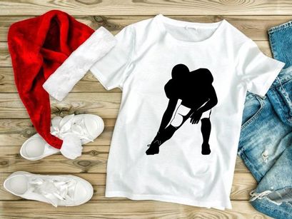 American football player in three point stance silhouette