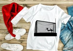 Soccer goalkeeper diving to block a shot on goal in a soccer match
