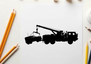 Silhouette of a tow truck with a boat on a trailer
