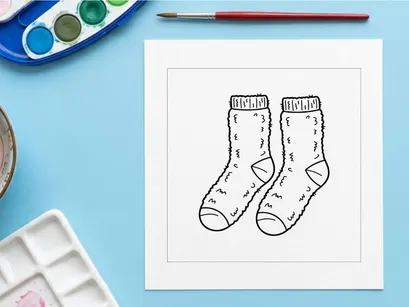 Hand-drawn Christmas socks with doodle designs and festive holiday patterns for seasonal decor