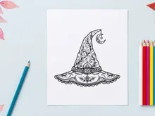 Elegant witch hat with lace trim for Halloween costume. Classic black sorceress accessory with ornate embroidery and scalloped edge design.