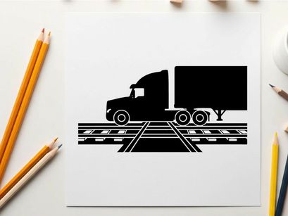 Silhouette of a semi truck on railroad tracks