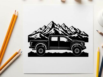 Silhouette of a pickup truck in front of majestic mountain range silhouette