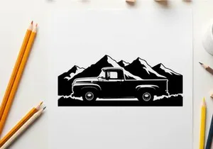 Silhouette of a vintage pickup truck in front of majestic mountain range silhouette