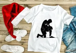 Soccer player kneeling on one knee in contemplation or injury assessment