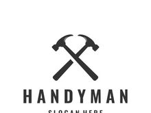 Vintage retro crossed hammers logo.